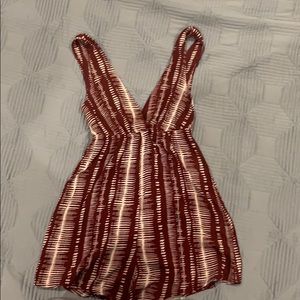Cute romper (never worn, with tags)